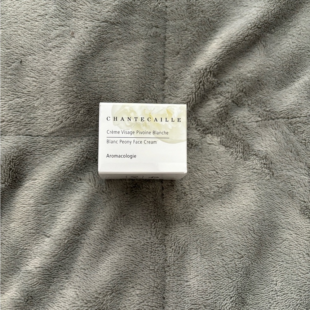 Chantecaille Skincare Box with White and Gray Design